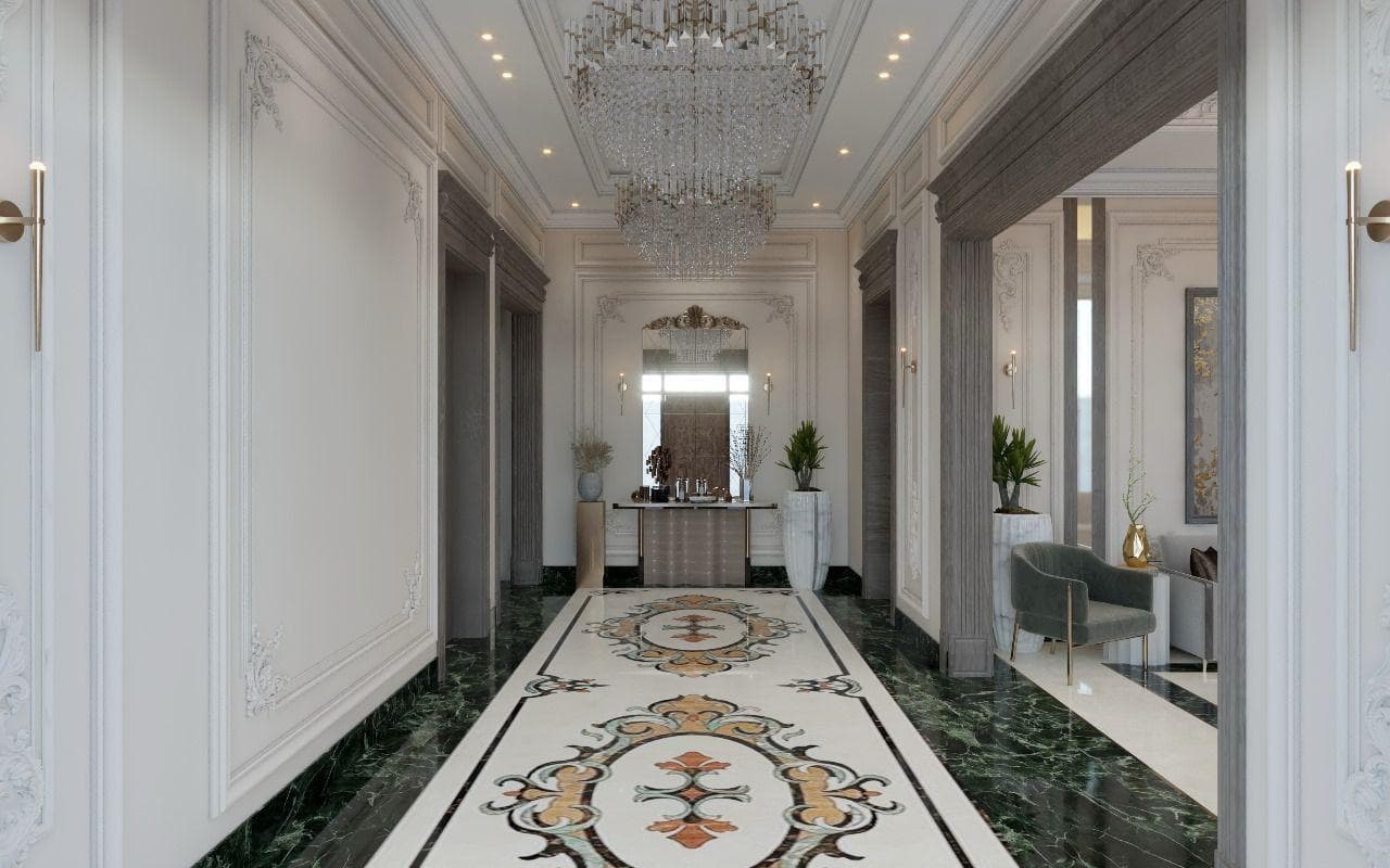 Classical corridor with a marble floor medallion, green marble banding, panelled walls and a run of chandeliers