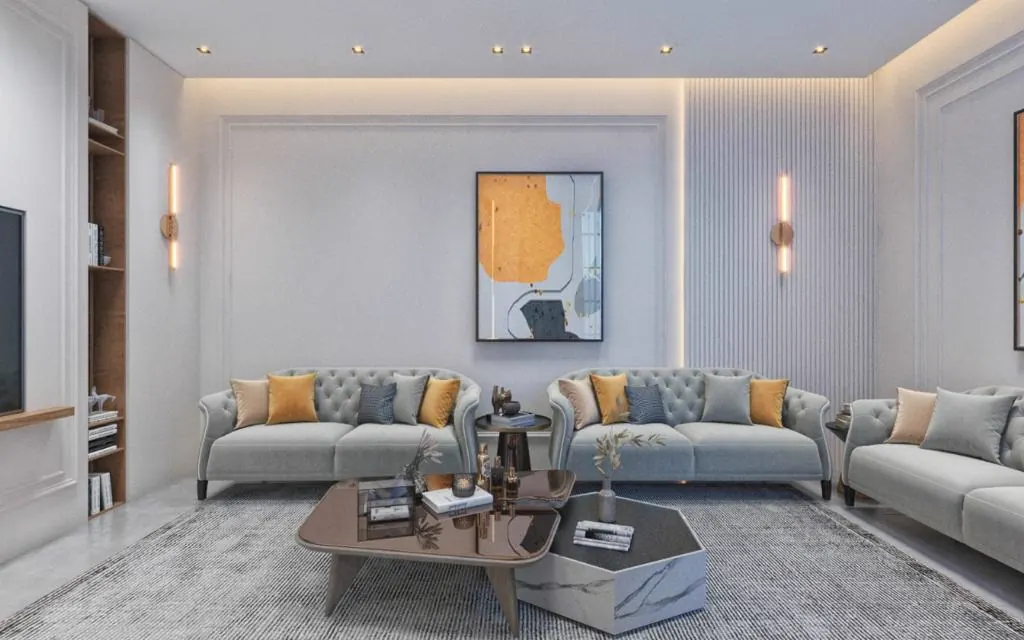 Long majlis with pale sofas and mustard cushions