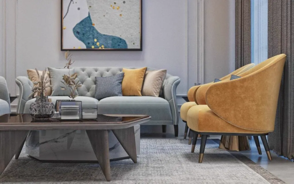 Sitting room with a tufted sofa and mustard occasional chairs