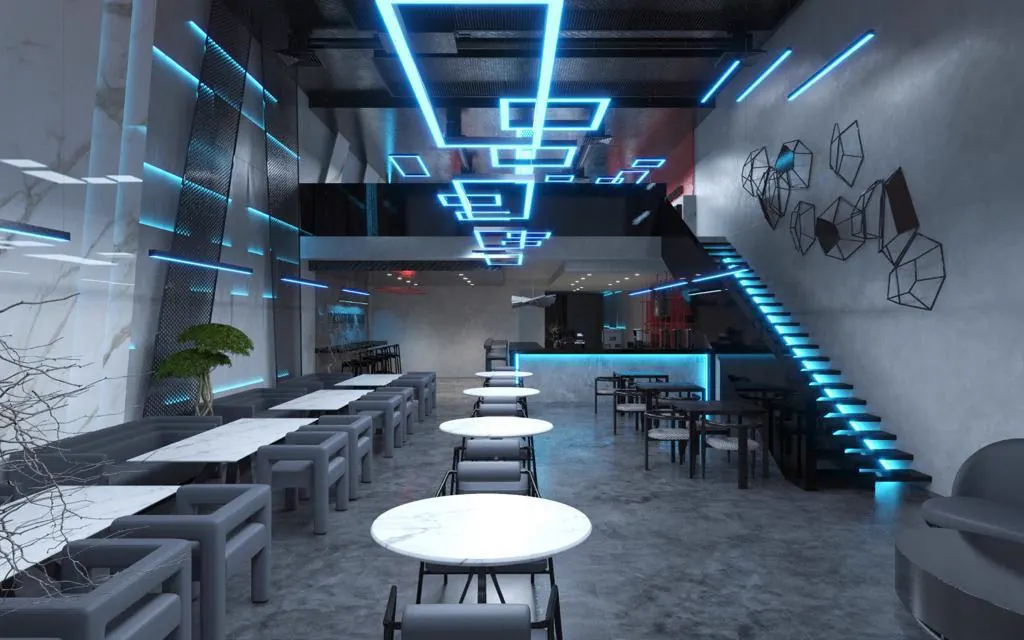 Lounge with a neon ceiling feature and a blue-lit staircase