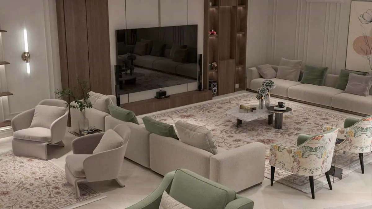 Majlis with sage armchairs on a floral rug