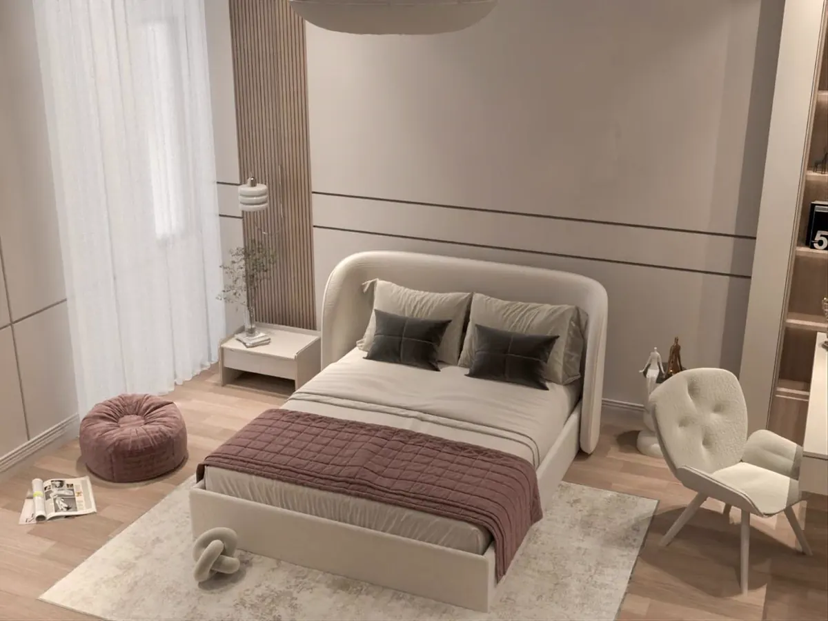 Cream bedroom with a rounded headboard and pink pouffe