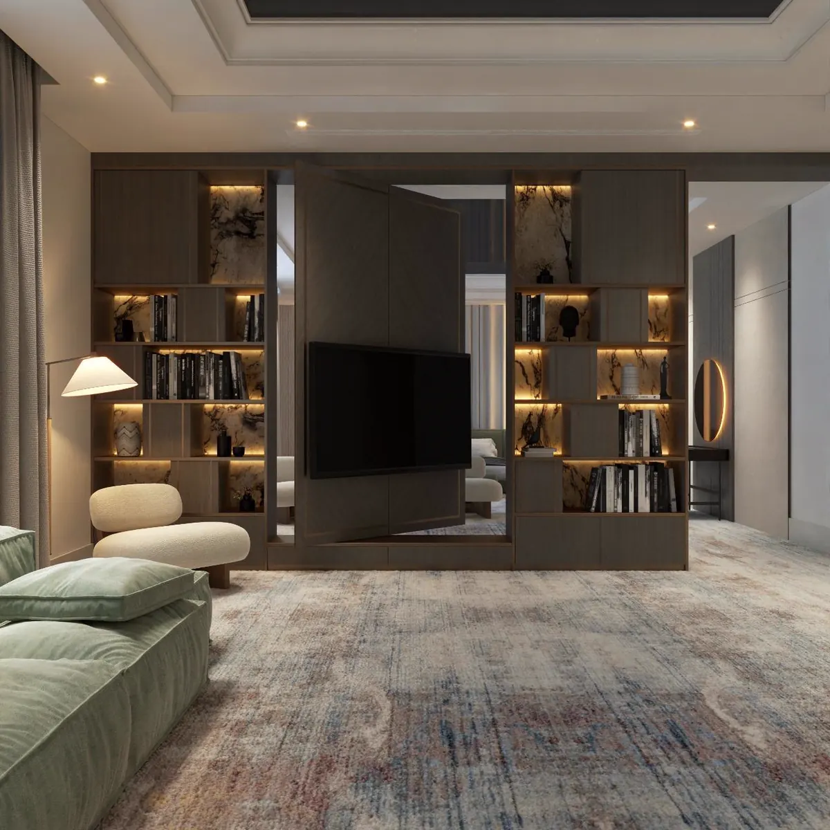 Study with built-in library shelving and a green chaise