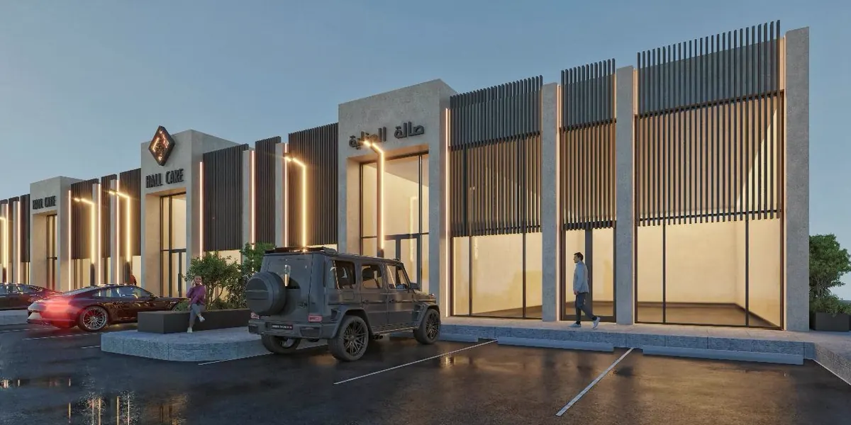 Commercial showroom frontage lit at night