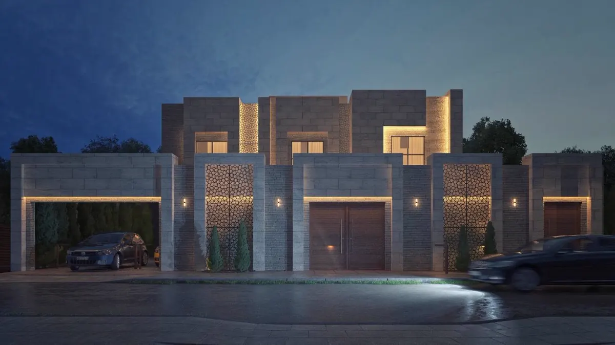 Villa street elevation at night with cars at the gate